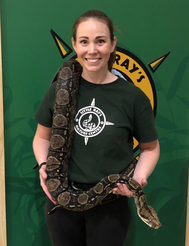 Kristy Cantú holding a snake